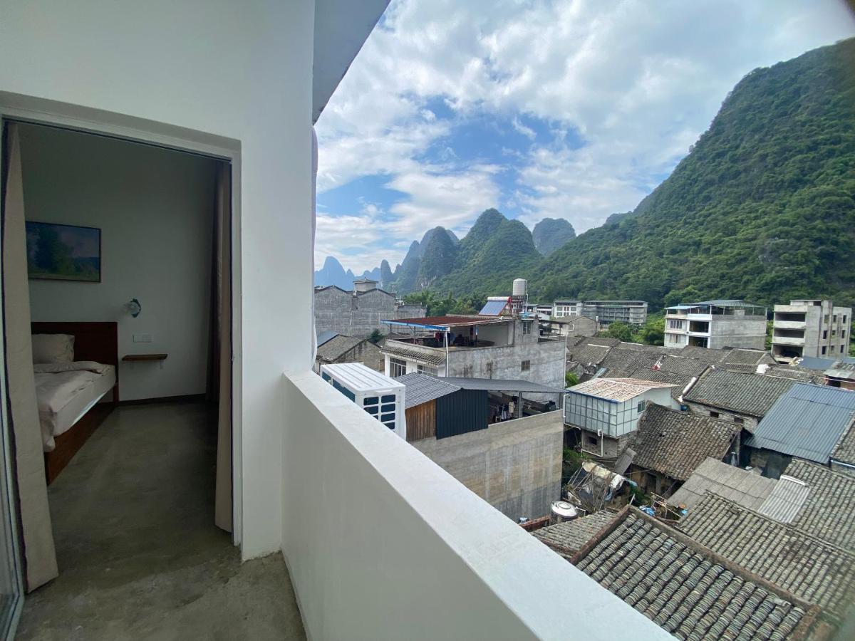 Pomelo Hostel Xingping Яншо Экстерьер фото